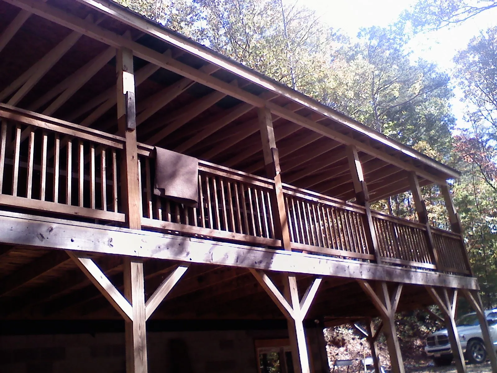 Timber framing under a new elevated porch and deck — Roof Leak Repair in McCall by Roofing Brothers